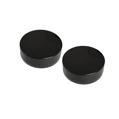 Two screw-on urine bottle caps by Compo Closet Australia, shown in a close-up image, designed for secure closure.
