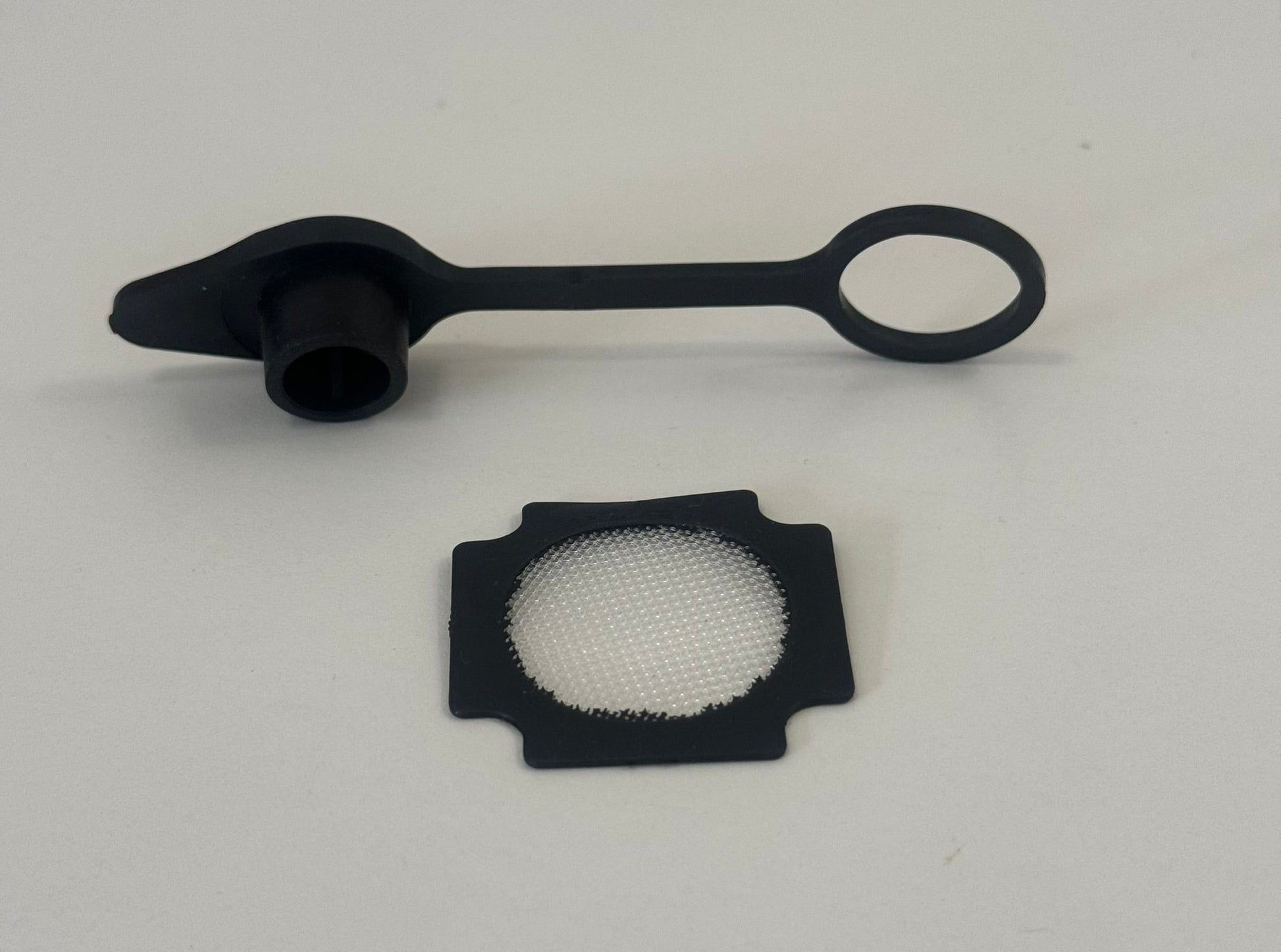 Fly screen and vent plug kit by Compo Closet Australia, showing mesh screen and vent plug components for window installation.